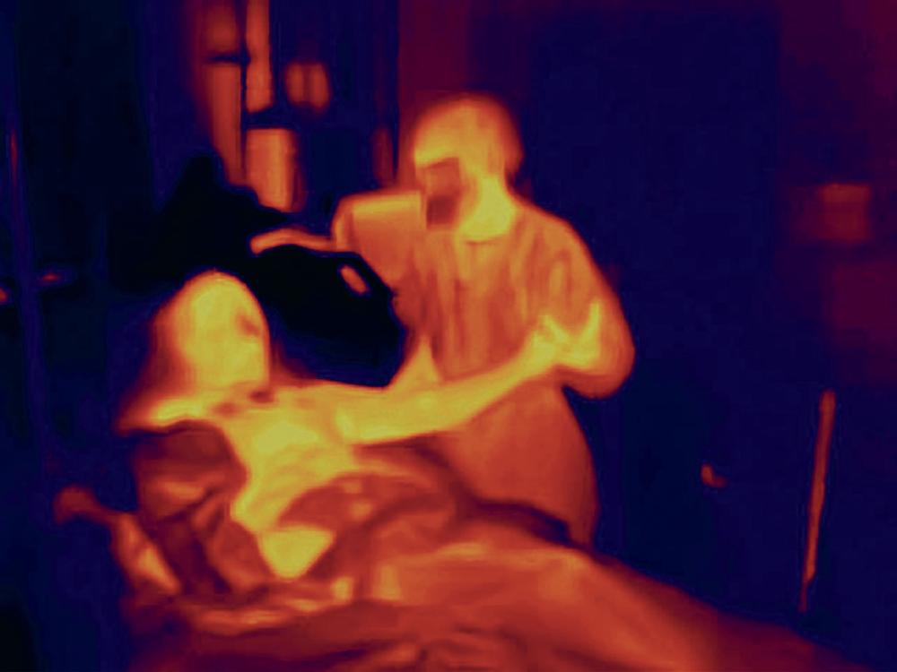 This image was taken by Magnum photographer Antoine d'Agata at the intensive unite of a French hospital during the Covid-19 outbreak in 2020. It is part of the book "Virus" published at Studio Vortex.