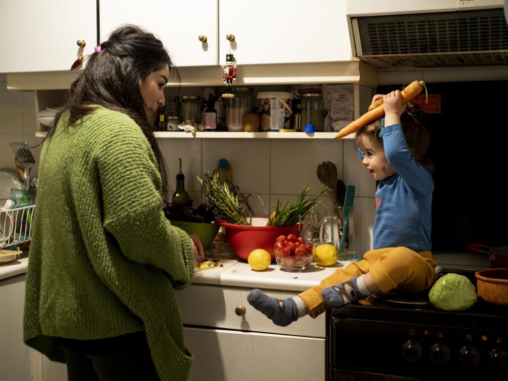 This daily life moment, between mother and child, was taken by Enri Canaj in Athens, Greece, on 11 April 2020
